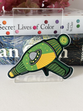 GREEN SPACE AGE RAYGUN Glossy Vinyl Sticker